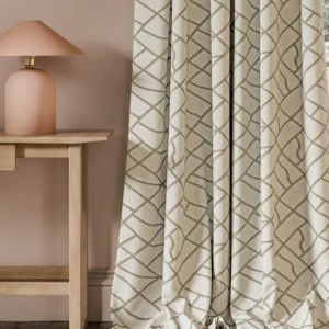 neutral contemporary curtain with side table and lamps