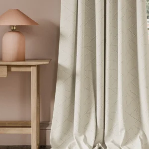 neutral contemporary curtain with side table and lamps