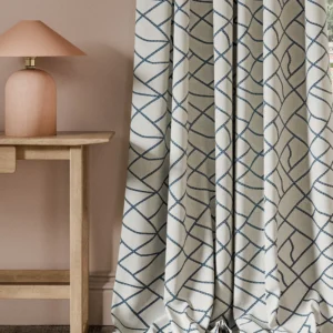 blue contemporary curtain with side table and lamps