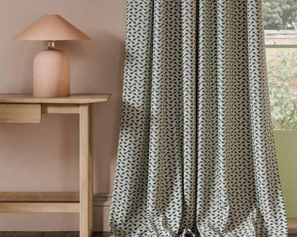 Necto Fabric - Ink by blue geometric curtain with side table and lamps