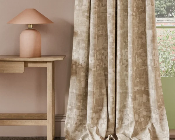 neutral misc curtain with side table and lamps