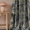 blue misc curtain with side table and lamps