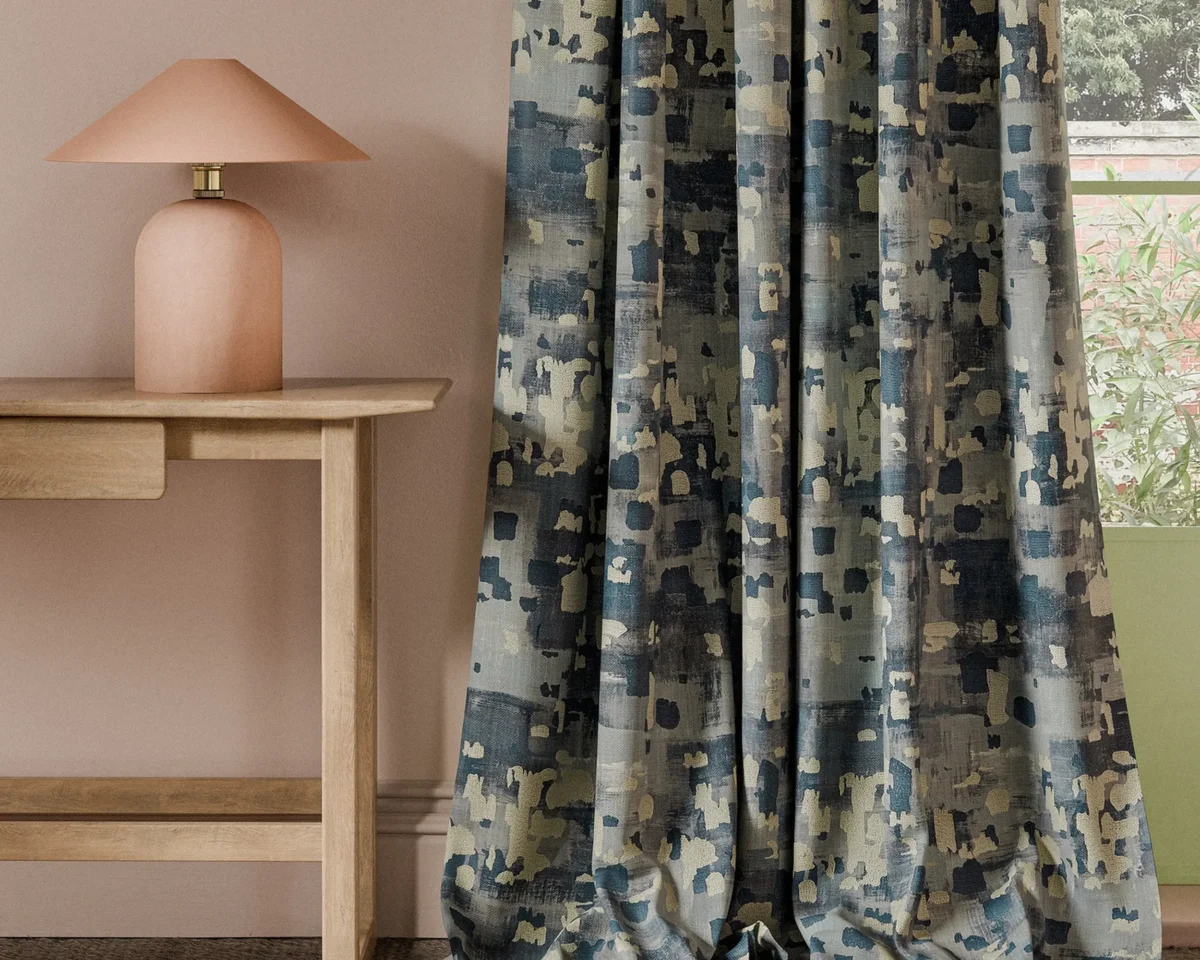 blue misc curtain with side table and lamps