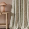 neutral misc curtain with side table and lamps