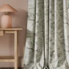 black-grey misc curtain with side table and lamps