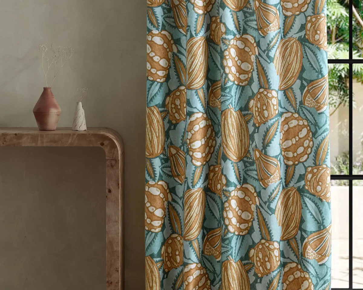 Zenith Fabric - Terracotta / Azul by blue botanical curtain with side table and vases
