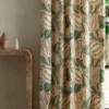 green botanical curtain with side table and vases