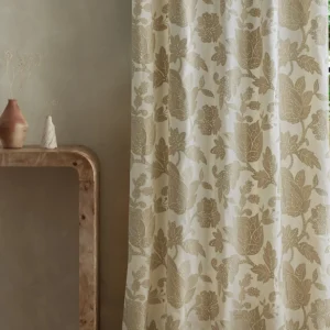 neutral botanical curtain with side table and vases