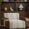 neutral traditional curtain with side table and vases