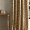 multicolour striped curtain with side table and vases