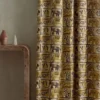 neutral animal curtain with side table and vases
