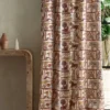 blue animal curtain with side table and vases