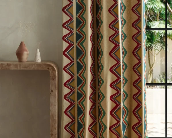 Kaleido Fabric - Scarlet / Midnight by multicolour striped curtain with side table and vases