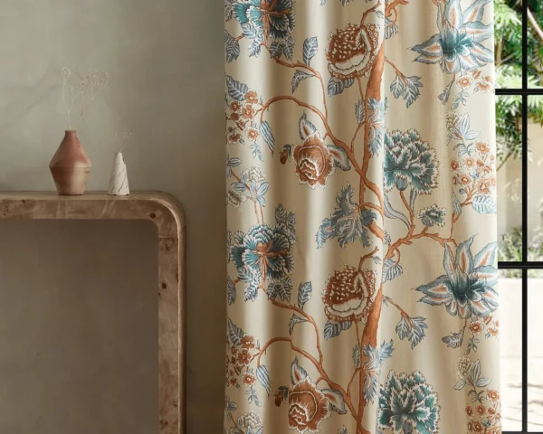 Indienne Fabric - Terracotta / Azul by brown botanical curtain with side table and vases
