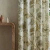 neutral botanical curtain with side table and vases