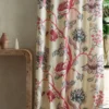 red botanical curtain with side table and vases