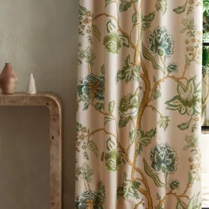 green botanical curtain with side table and vases