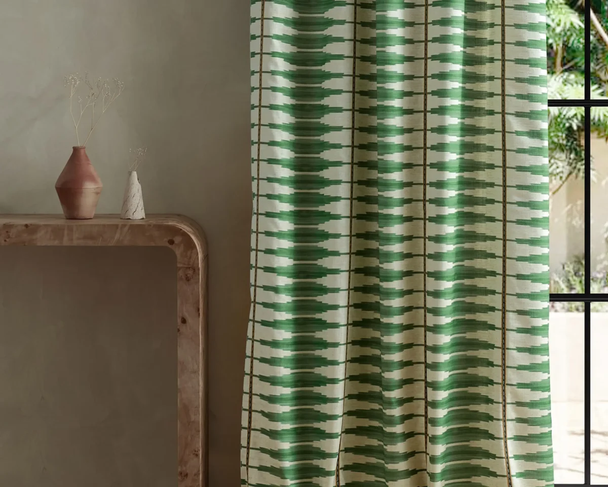 Cintilla Fabric - Evergreen / Spice by green striped curtain with side table and vases