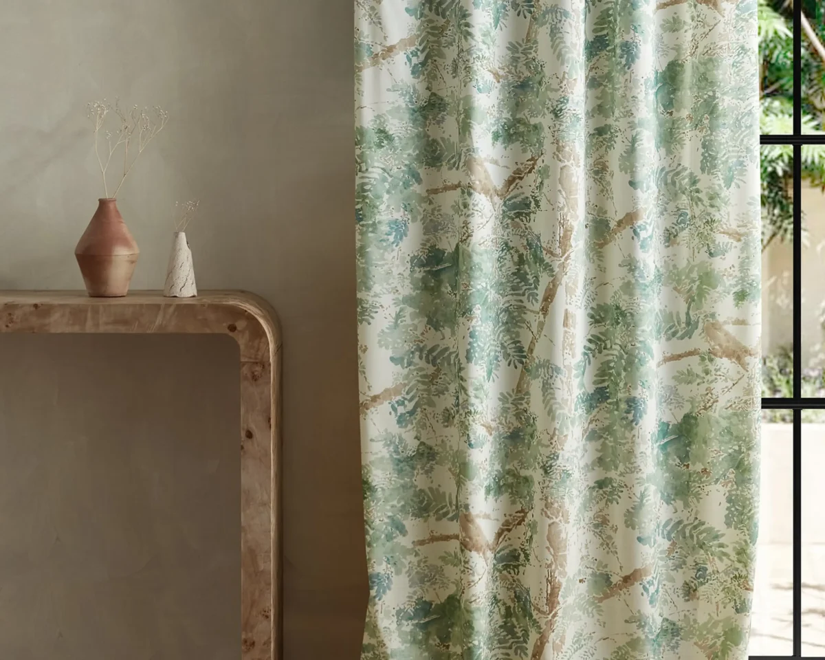 Ceiba Fabric - Pine by green botanical curtain with side table and vases