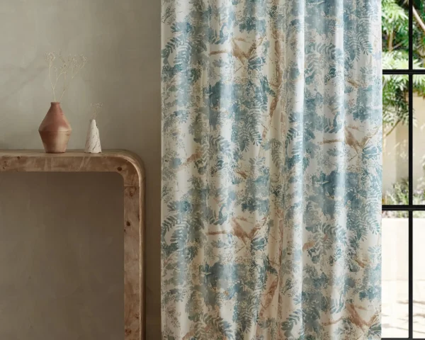 Ceiba Fabric - Azul by blue botanical curtain with side table and vases