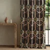 pink geometric curtain with side table and vases