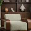 neutral striped armchair with plants and vases