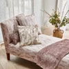 neutral contemporary bed with cushion and plants