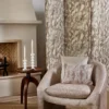 brown contemporary armchair with cushion