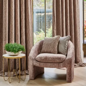 brown contemporary armchair with curtain and cushion