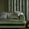 red striped sofa with cushion and curtain