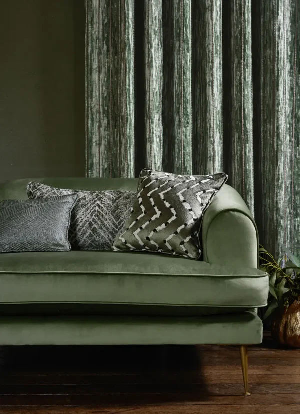 Trenzado Fabric - Desert by red striped sofa with cushion and curtain