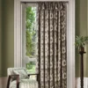 brown misc curtain with armchair and plants