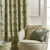 brown geometric curtain with armchair and cushion