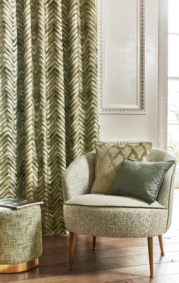 brown geometric curtain with armchair and cushion
