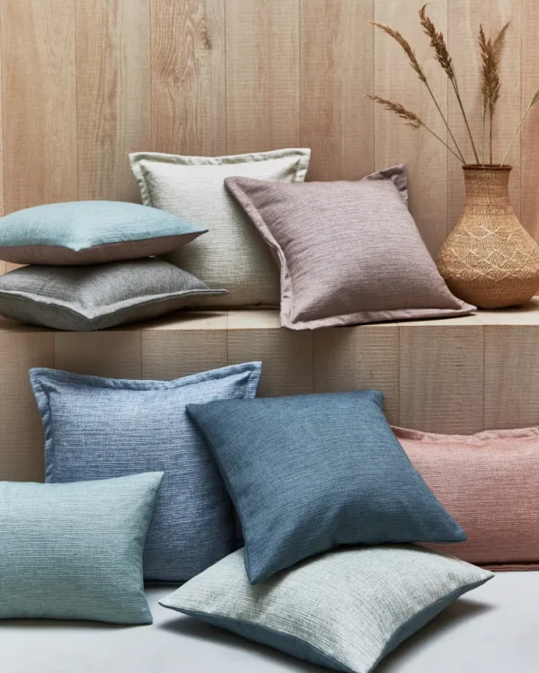 Java Fabric - Nile by red plain cushion with sofa and vases