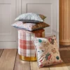 pink botanical curtain with pouf