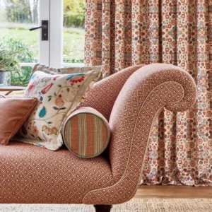 green geometric sofa with cushion and curtain