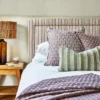 black-grey spotted cushion with bed and lamps