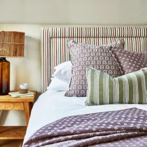 black-grey spotted cushion with bed and lamps