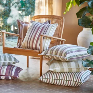 red striped blind with plants and vases