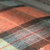 Skye Fabric from Abraham Moon & Sons Plaids & Tartans collection - purple checked woolen
