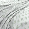 Sprigg Fabric from Wemyss Wee Prints collection - green spotted printed