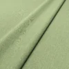 Pluto Fabric from Linwood Fabrics Pluto collection - green plain woven