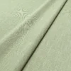 Pluto Fabric from Linwood Fabrics Pluto collection - green plain woven